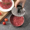 Vista detallada de la prensa de hamburguesas de acero inoxidable con placa y molde. - Tipo estándar