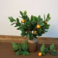Pianta in vaso di arancio artificiale finto fogliame di agrumi decorazione per soggiorno - Ramo d'Arancia / Singolo Ramo (Borsa OPP)