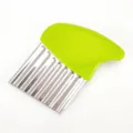 Stainless steel crinkle cutter with green plastic handle for cutting french fries potatoes. - Green Potato Slicer