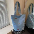 Borsa shopper in denim casual da donna, elegante borsa a secchiello ricamata capiente. - Azzurro