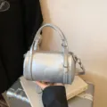 Trendy silver cylinder pillow bag for women, stylish casual crossbody shoulder handbag. - Silver No Pendant