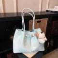 Sac cabas tisse bleu clair elegante avec grande capacite pour le travail et les loisirs. - Avec Pendentif / Bleu