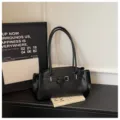 Black leather shoulder bag for women, stylish underarm tote with buckle design for daily commute. - No Pendant / Black
