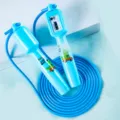 Kinder Cartoon blaues Springseil mit mechanischem Zähler und niedlichem Dinosaurier Print. - Blau