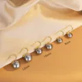 Graue Perlen Ohrhaken Variante in 8mm, 10mm und 12mm Größen für elegante Damenmode. - Platinierte Graue Künstliche Perle / 10mm