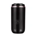 Portable mini electric shaver for men, black body with rose gold ring and USB charging. - Black