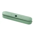 Compact automatic food vacuum sealer machine in light green for household kitchen use. - Green