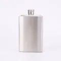 Stainless steel pocket hip flask with brushed finish, portable metal container for outdoor use. - Silver
