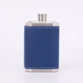 Stainless steel hip flask with blue leather wrap, portable pocket size for outdoor drinking. - Blue
