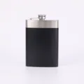 Portable 9oz stainless steel hip flask in matte black finish, perfect for outdoor travel. - Black