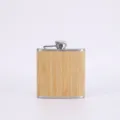 Detailed view of the stainless steel hip flask featuring bamboo texture and metal cap. - Style 3