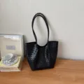 Black woven leather tote bag for women, stylish large capacity shoulder bag for daily commute. - Black