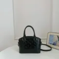 Black fashion handbag for women, stylish shoulder crossbody bag with embossed design. - No Pendant / Black