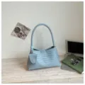 Vintage light blue woven leather underarm handbag, elegant hobo shoulder bag for women. - Blue