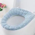 Thick plush knitted toilet seat cover in light blue O-shaped design for bathroom comfort. - Nordic Blue