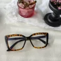 Detailed closeup of trendy leopard print optical eyeglasses frame for daily wear. - Black Frame With Leopard