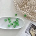 Perline ciondoli di frutta in vetro verde per la creazione di gioielli fai da te accessori. - Pera
