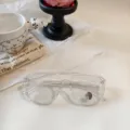 Gafas de sol aviador con montura transparente y lentes fotocromáticas detalle. - Transparente