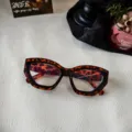 Gafas de sol de leopardo con montura gruesa, estilo moderno para calle y exterior. - Mármol Crema Lentes Transparentes