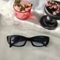 Lunettes de soleil rétro noires œil de chat pour femmes, tendance vintage protection UV. - Monture Noire Verres Bleus
