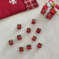 Christmas glass beads red gift box shape DIY handmade jewelry accessories pendant detail shot. - Gift Box