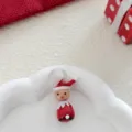 Detailed shot of handmade Christmas glass Santa pendant accessory, festive red and white charm. - Large Santa Claus