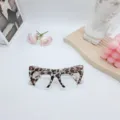 Modieuze kattenoog blauwlichtfilter bril met trendy luipaardprint half-montuur design voor dames. - Grijs Schildpad