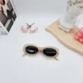 Trendy oval sunglasses for women, retro beige frame design, stylish summer eyewear accessory. - Milky Tea Green