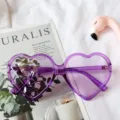 Lunettes de soleil en forme de cœur violet monture transparente tendance style vintage femme - Violet