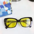 Modische Damen Sonnenbrille mit schwarzem quadratischem Gestell und gelben Gläsern für Alltag. - Schwarzer Rahmen Gelbe Gläser