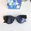 Black cat-eye sunglasses with dark lenses and stylish geometric frames for daily street fashion wear. - Black Frame Full Grey