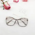 Clear grey cat-eye glasses frame with metallic temples, stylish TR90 optical eyewear style. - Transparent Gray