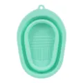 Foldable silicone makeup brush cleaning pad in mint green, essential beauty tool for daily use. - Green