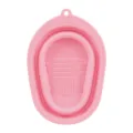 Foldable silicone makeup brush cleaning pad in pink, portable tool scrubber mat for daily use. - Pink