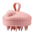 Pink silicone scalp massage shampoo brush with liquid dispenser and convenient hand strap. - Nude Shampoo Brush