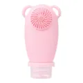 Pink silicone travel squeeze bottle with facial cleansing brush, portable refillable container. - Pink