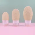 Silicone travel bottles set, portable squeeze cosmetic containers in three convenient sizes. - Creamy Yellow