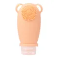 Orange silicone facial cleansing brush travel bottle, portable squeeze bottle for shampoo. - Orange