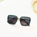 Detailed view of trendy green thick-frame square sunglasses with gradient lenses for women. - Green