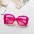 Close-up detail view of stylish pink transparent chunky round frame sunglasses. Perfect for outfits. - Rose Red