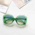 Large green oversized round frame sunglasses, stylish gradient lenses fashion eyewear decor. - Transparent Green