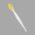Brosse nettoyante pour le visage en silicone double face avec tête jaune et manche. - Jaune