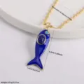 Detail shot of the 18K gold plated enamel fish pendant necklace, showcasing exquisite craftsmanship. - Dark Blue-1 (Pendant + Necklace)
