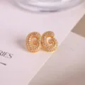Gold-plated micro-paved cubic zirconia letter G stud earrings for trendy fashion style. - Letter G