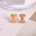 Gold-plated micro-paved zirconia letter stud earrings, elegant jewelry accessory for women. - Letter I