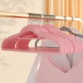 Pink wide shoulder non-slip plastic clothes hangers for home wardrobe organization. - Flocked Hangers / Pink