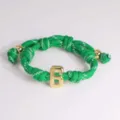 Green braided rope bracelet featuring a 3D gold number 6 charm and sleek metallic beads. - 6