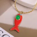 Gold plated rope chain red enamel fish pendant necklace with green and blue zirconia stones. - Red-3 (Pendant & Necklace)