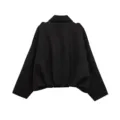 Black short jacket back detail showing classic collar and hem design for women apparel. - S / Tops / Black