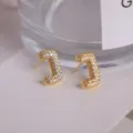 Gold letter J zircon stud earrings, elegant pavé crystal alphabet ear jewelry for women. - Letter J